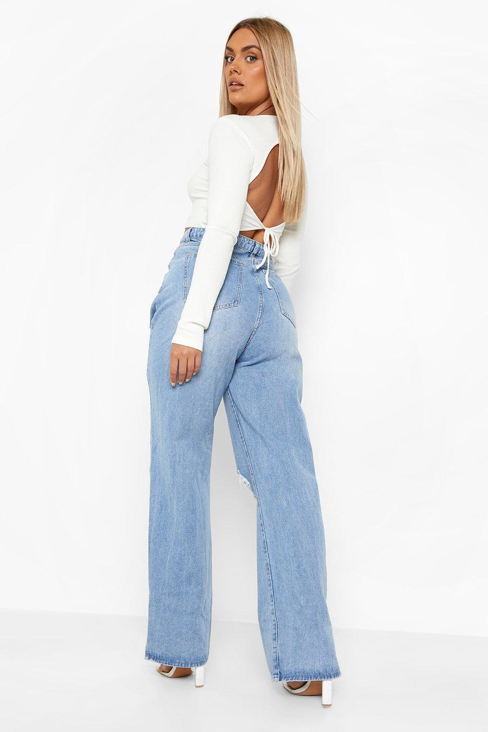 Plus High Waisted Distressed Split Hem Wide Leg Jeans boohoo IE